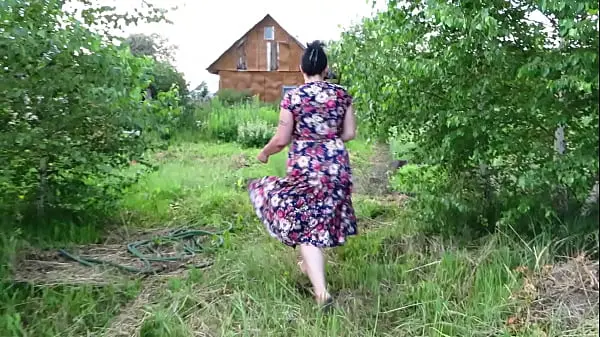 Thumbnail: Big Ass MILF Bends Over Picking Thick Cucumber in Yard